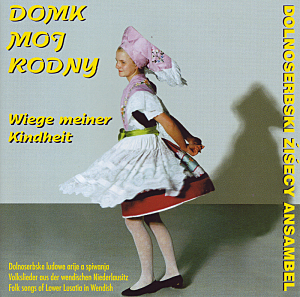 Titel der CD: Wiege meiner Kindheit, Titelbild: ein tanzendes Trachtenmädchen Titel der CD: Wiege meiner Kindheit, Titelbild: ein tanzendes Trachtenmädchen